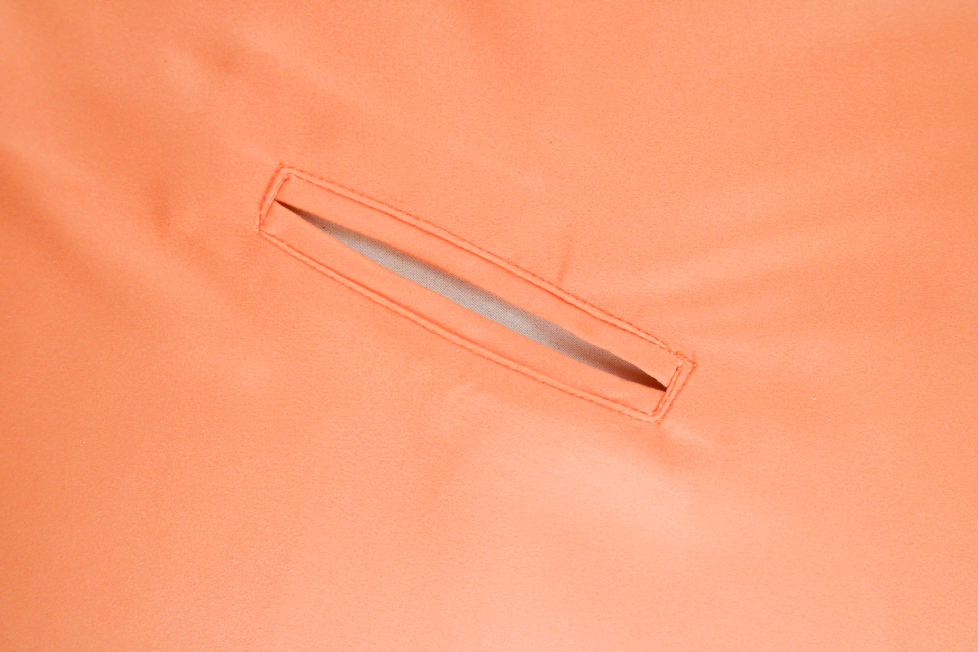 The Handy Beach Mat has a convenient hole for a beach umbrella pole