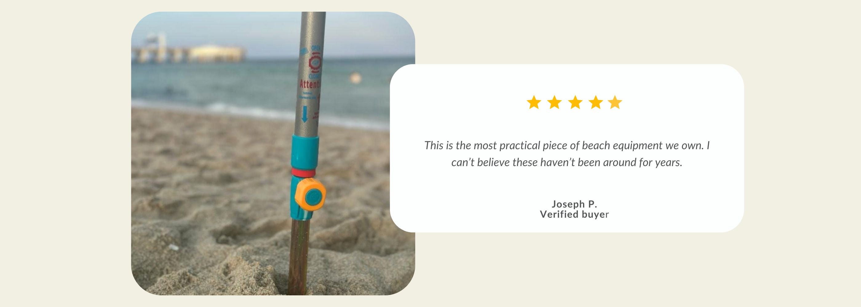 A beach umbrella pole in sand.| Handy Beach Goods
