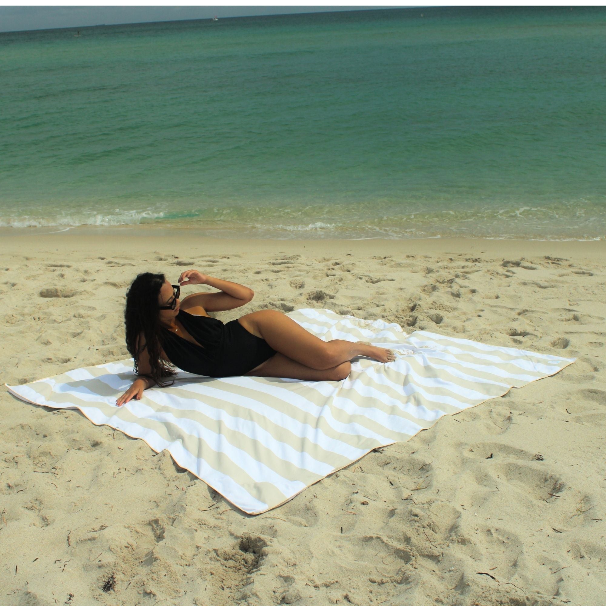Sand resistant beach blanket with umbrella hole – Handy Beach Goods