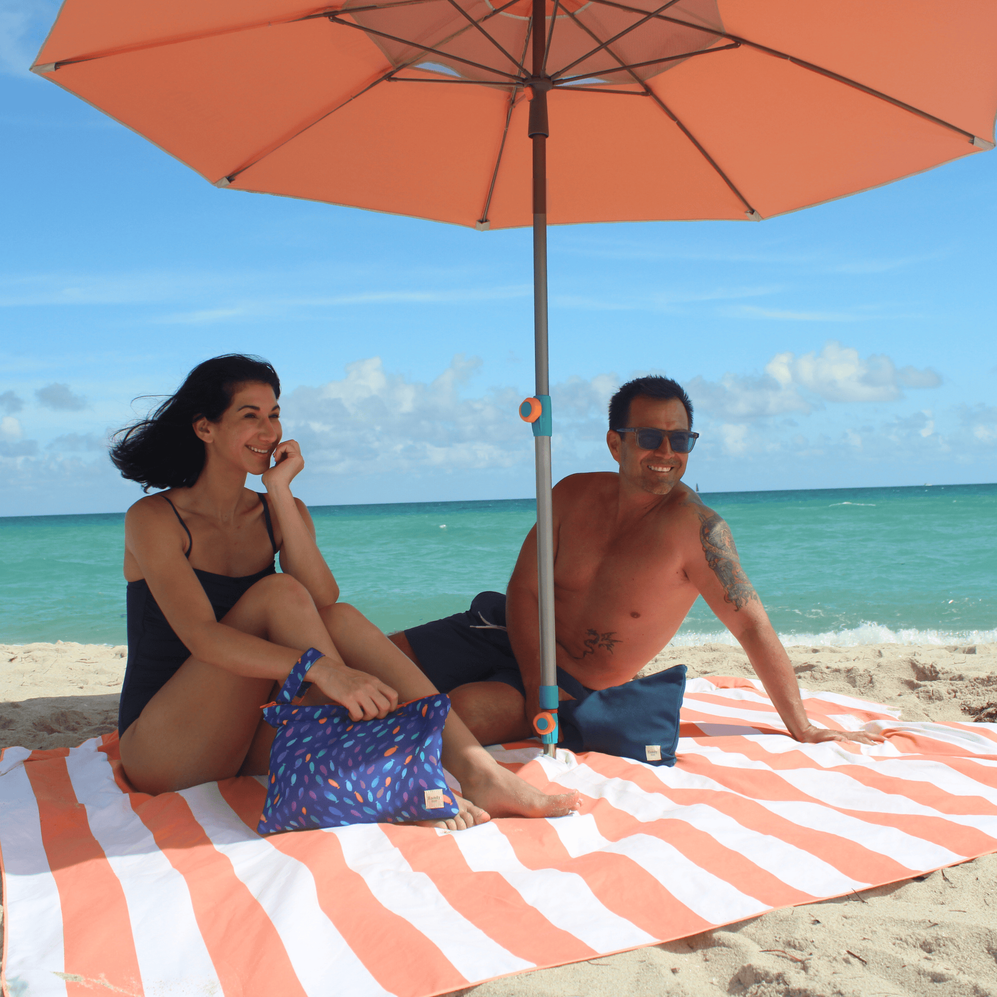 The ultimate wind-resistant beach umbrella, independently ASTM-tested to 30 mph with a 99.9% UV block solar shield canopy. peach umbrella system