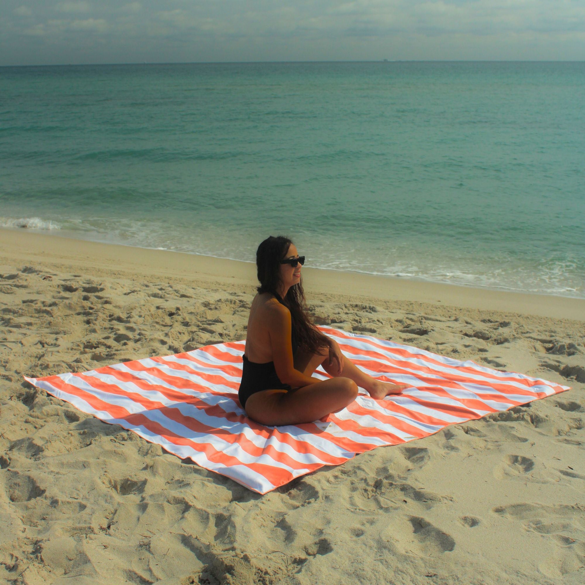 Sand resistant beach blanket with umbrella hole – Handy Beach Goods