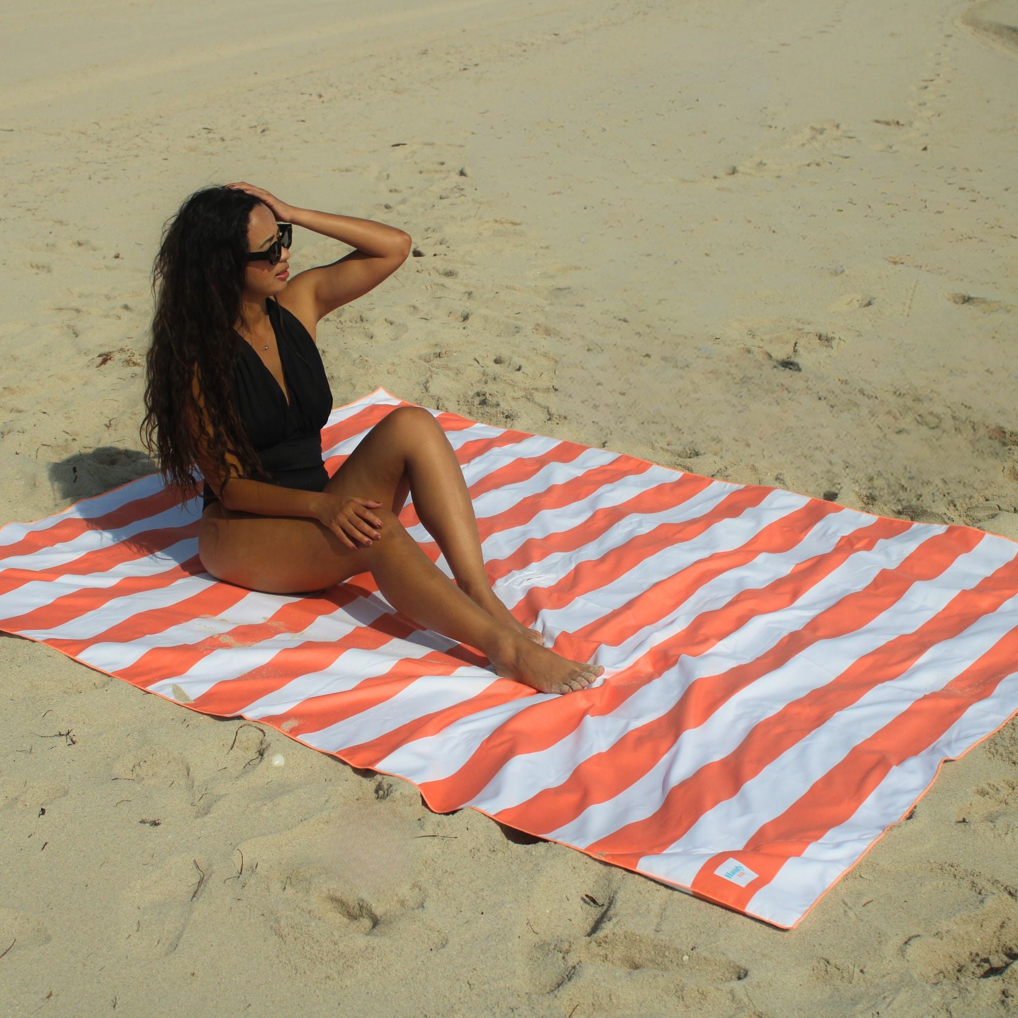Sand resistant beach blanket with umbrella hole – Handy Beach Goods