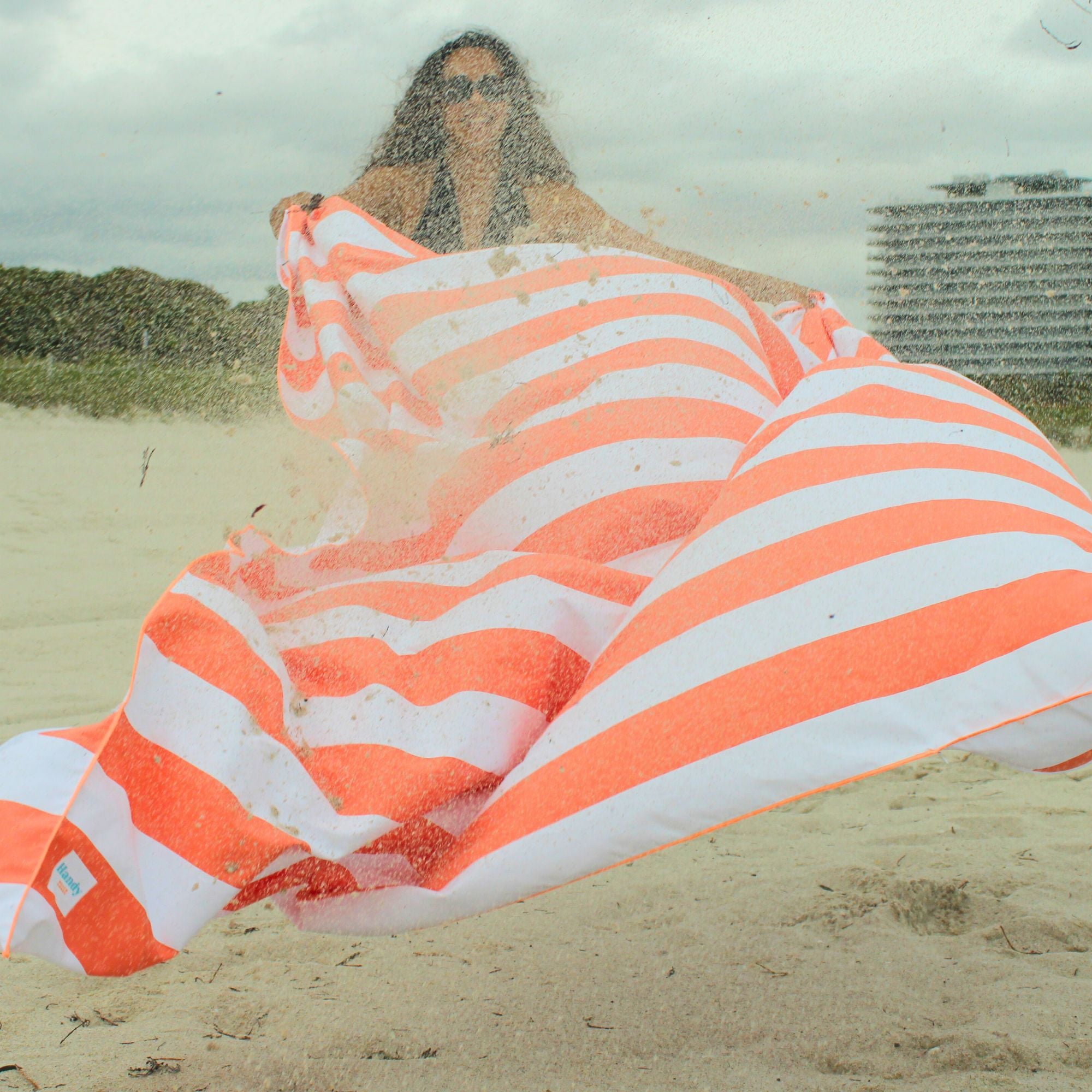 Sand resistant beach blanket with umbrella hole – Handy Beach Goods