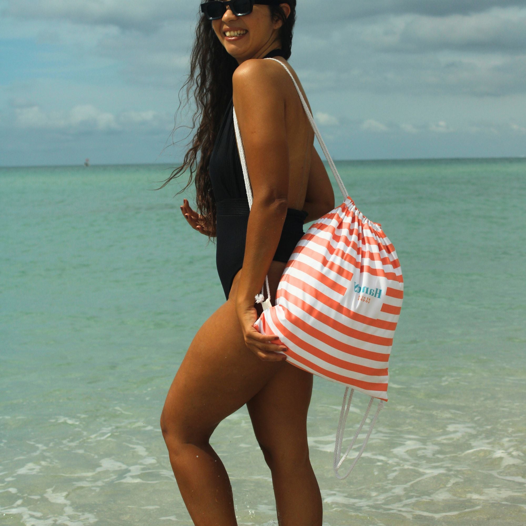 Sand resistant beach blanket with umbrella hole – Handy Beach Goods