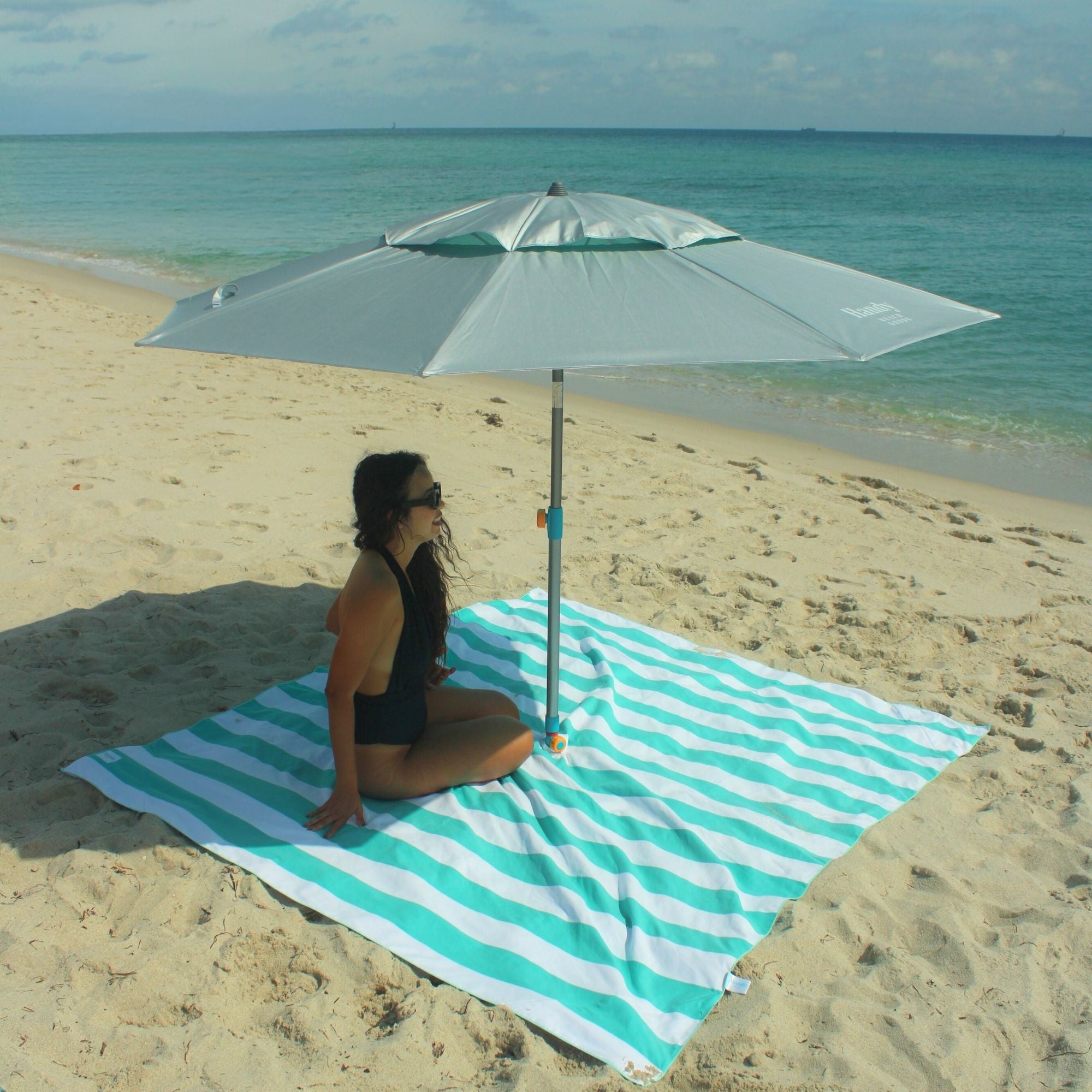 Sand resistant beach blanket with umbrella hole – Handy Beach Goods