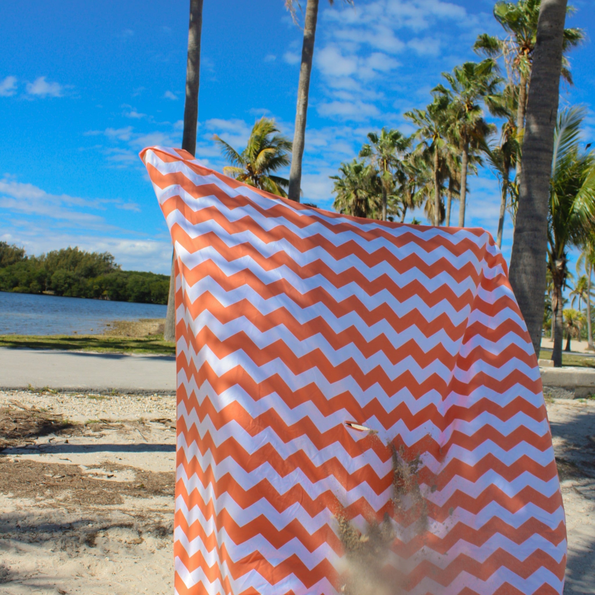 Sand resistant beach blanket with umbrella hole – Handy Beach Goods