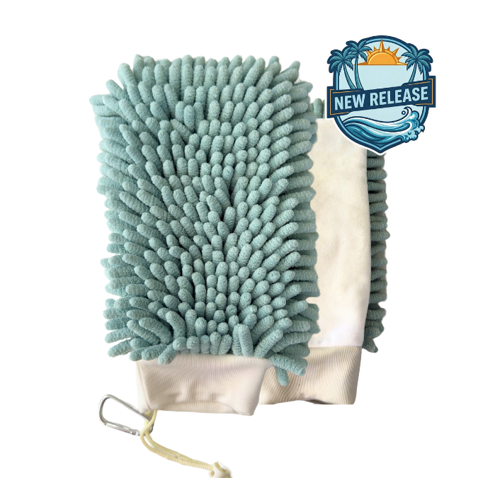 Close-up of the Handy dual-sided beach glove, showing the blue textured sand remover side, the smooth white sunscreen applicator side, and the attached bag clip.