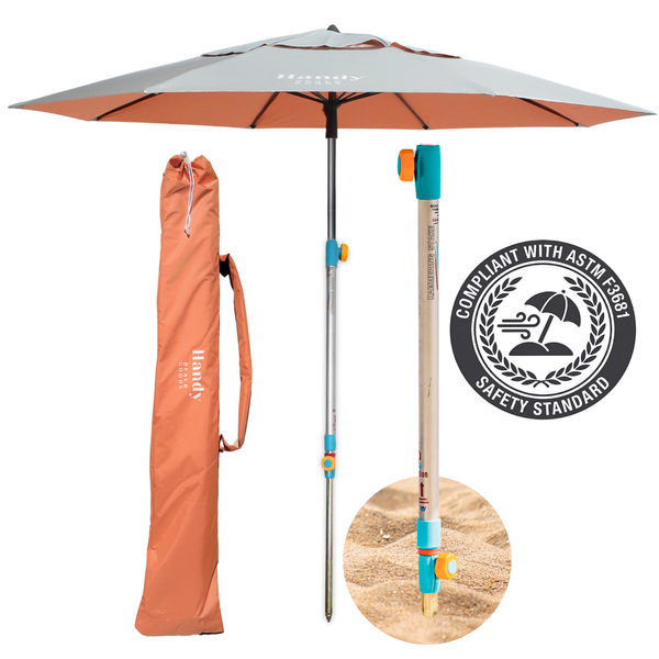 Wind-tested beach umbrella with UPF 55+ sun safety and anchor system, shown in Peach.