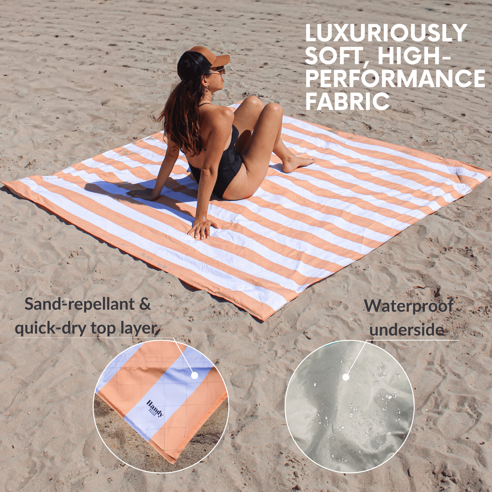 Woman sitting on a striped peach color beach blanket with waterproof underside 