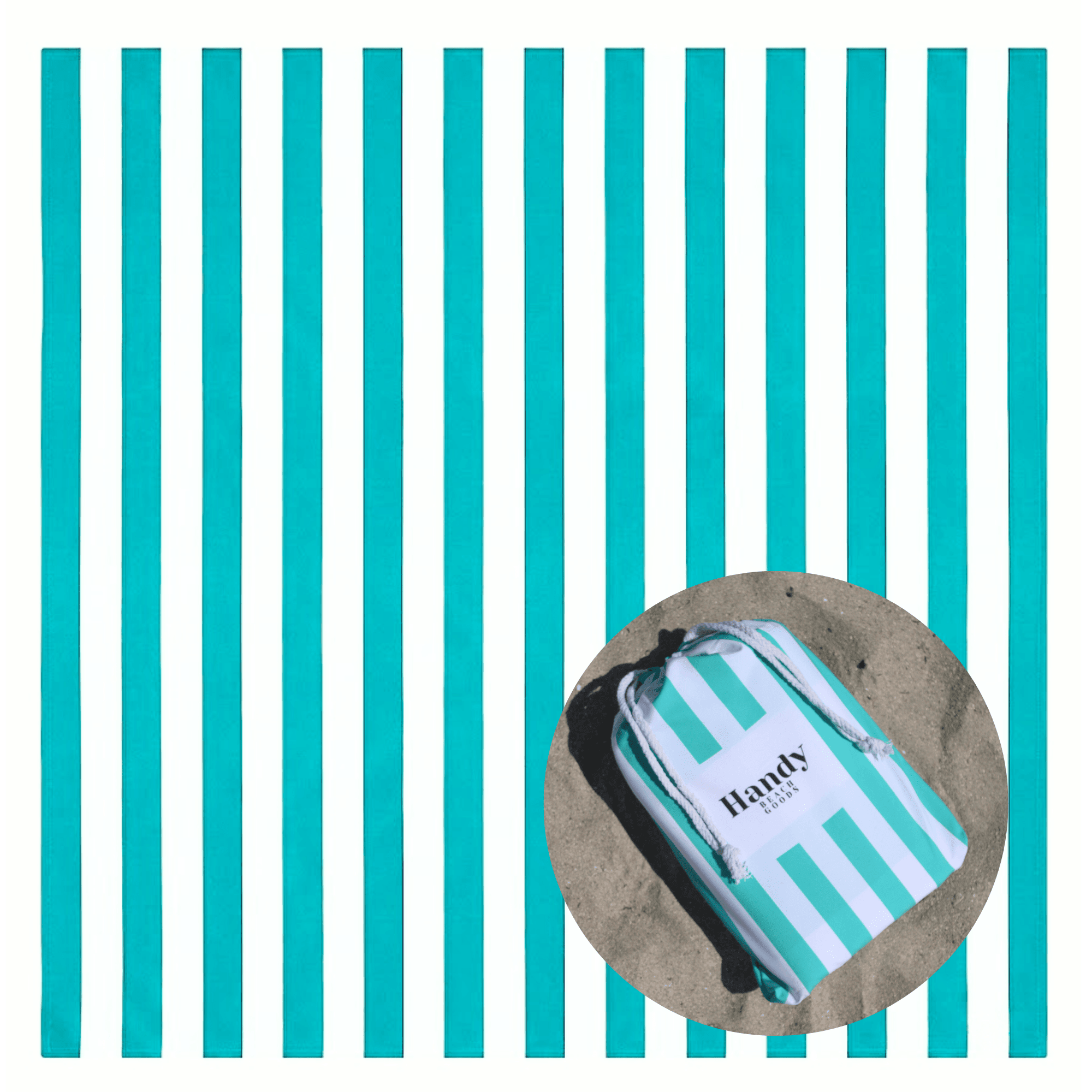 Oversized teal and white striped beach blanket and matching drawstring carrying bag resting on the sand.