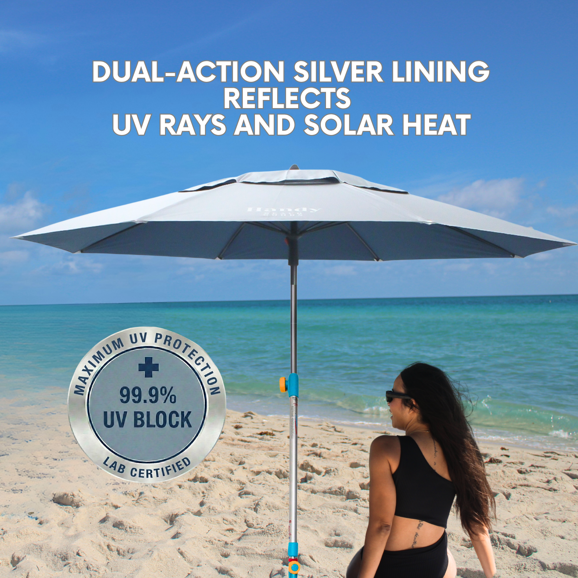 View of the silver and blue beach umbrella showcasing its premium silver-coated fabric  that provides maximum UPF 55+ UV sun protection.