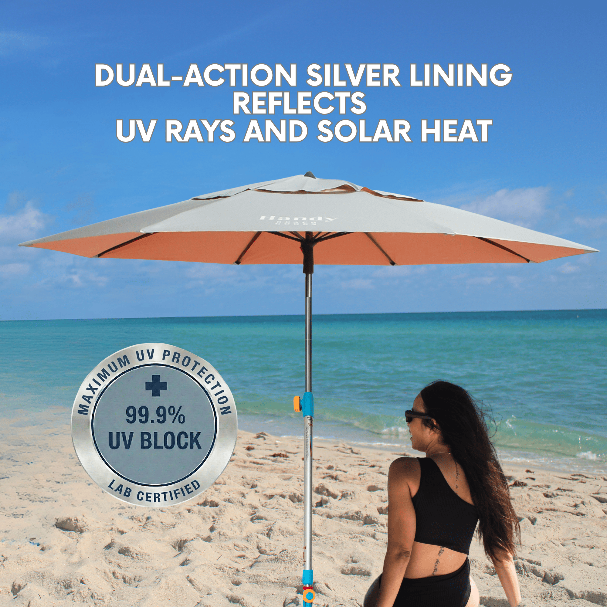 View of the silver and peach beach umbrella showcasing its premium silver-coated fabric that provides maximum UPF 55+ UV sun protection. peach umbrella system 