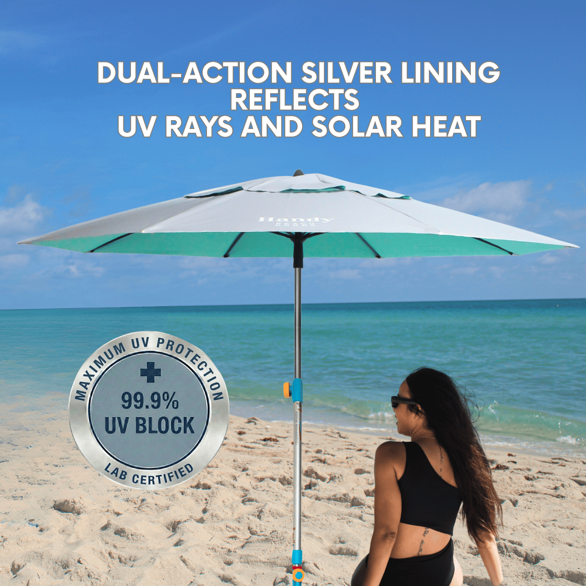 View of the silver and teal beach umbrella showcasing its premium silver-coated fabric that provides maximum UPF 55+ UV sun protection. teal umbrella system